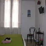 Quarto em Acomodações Particulares A Due Passi Dal Centro